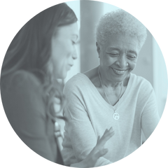 Two women looking at a chart